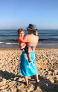 Load image into Gallery viewer, Turquoise Turkish towel wrapped around person at the beach, quick‑dry cotton