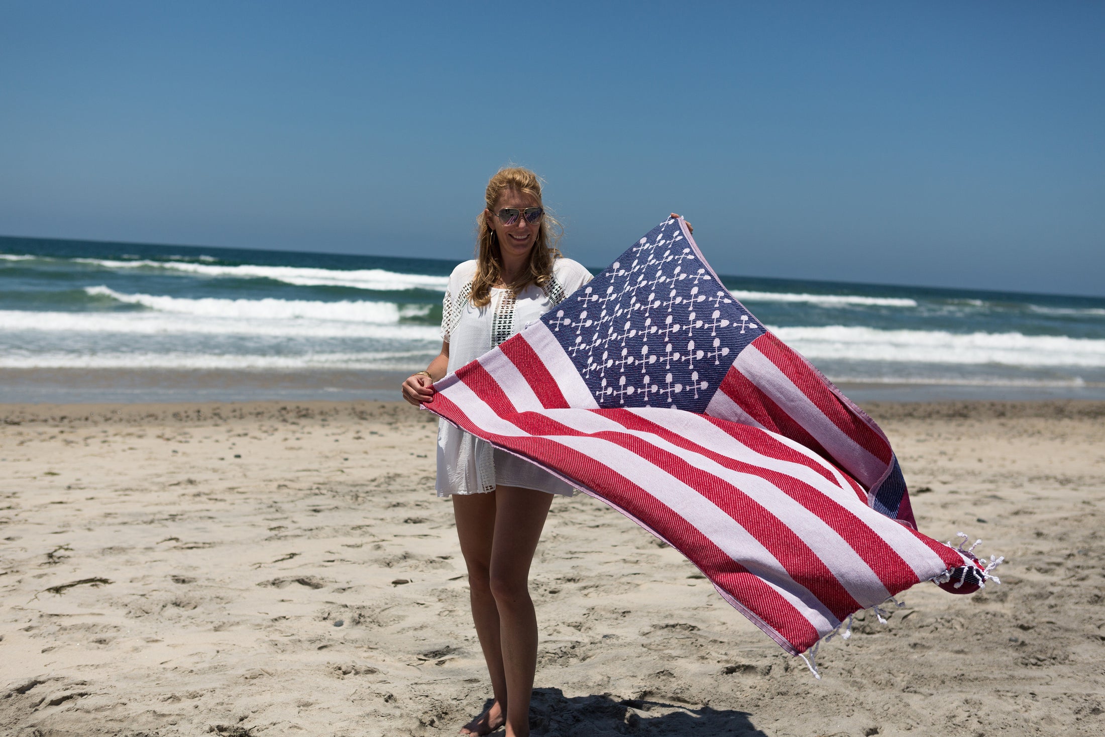 BeachMate American Flag Turkish towel used as a beach wrap – lightweight, patriotic quick-dry towel perfect for the 4th of July, swimming, and travel.