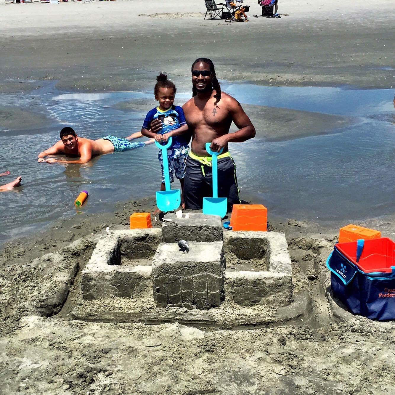 Family using Beachmate buckets and tote at the beach