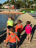 Load image into Gallery viewer, Kids on the beach wearing bright Beachmate long‑sleeve UPF 50 rash guards
