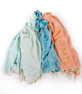 Load image into Gallery viewer, Three Turkish towels in mint green, blue, and orange colors with hand-tied fringe, laid out flat. Mint Turkish towel by Beachmate — lightweight, quick‑dry beach towel
