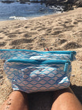 Load image into Gallery viewer, Medium Beachmate accessory pouch held at the beach
