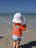 Load image into Gallery viewer, Infant sun hat on baby at the beach

