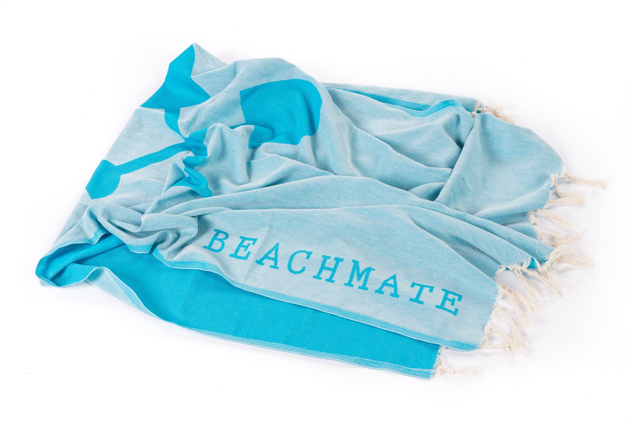 Turquoise Turkish towel by Beachmate laid flat with tassel fringe on white background